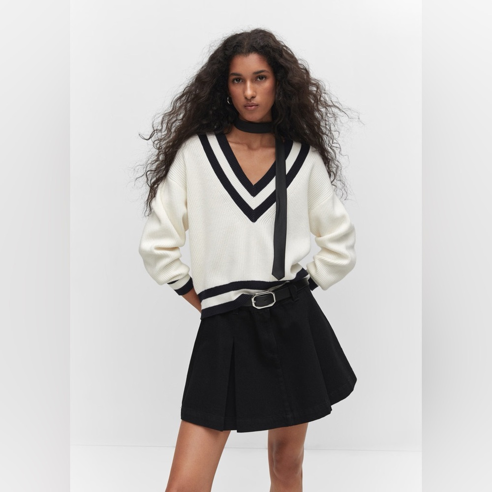 PLEATED DENIM MINI-SKIRT